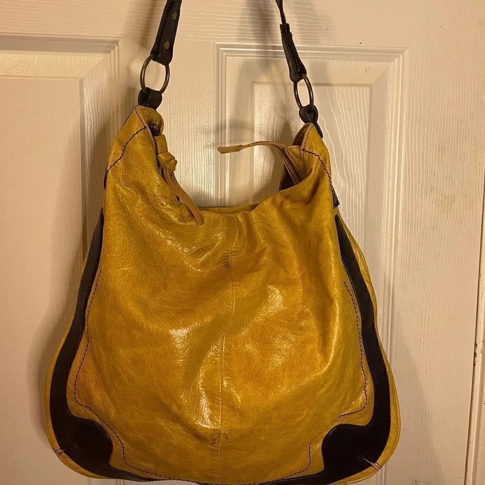 Kate Landry leather mustard yellow slouch shoulder bag with brow trim.